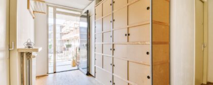 Hallway in home with plenty of cupboard space.